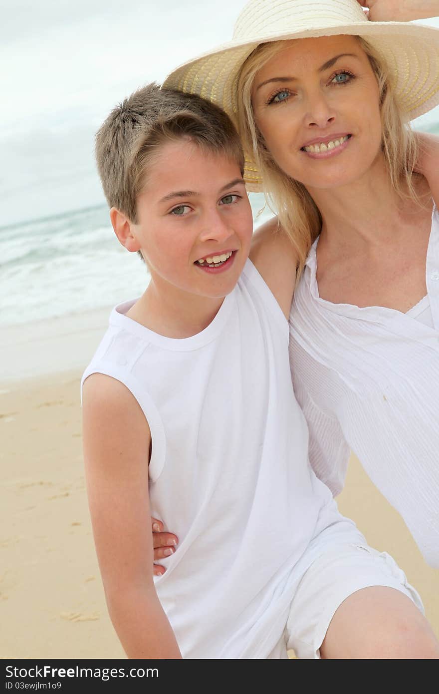 Mother and son at the beach. Mother and son at the beach