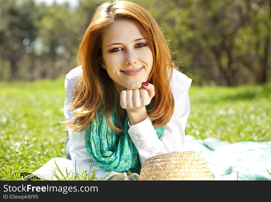 Girl At Grass In The Park.