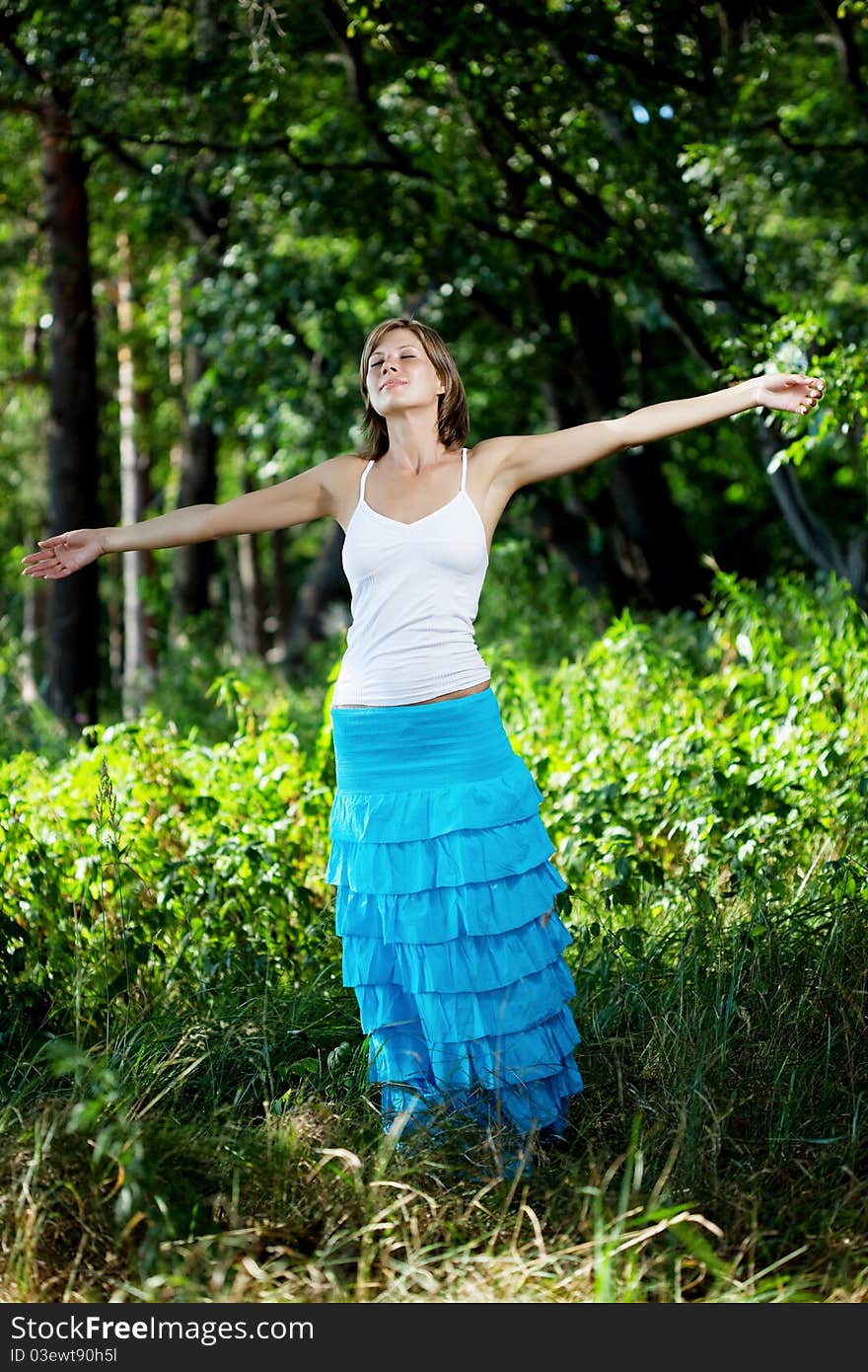 Beautiful Girl In A Summer Forest