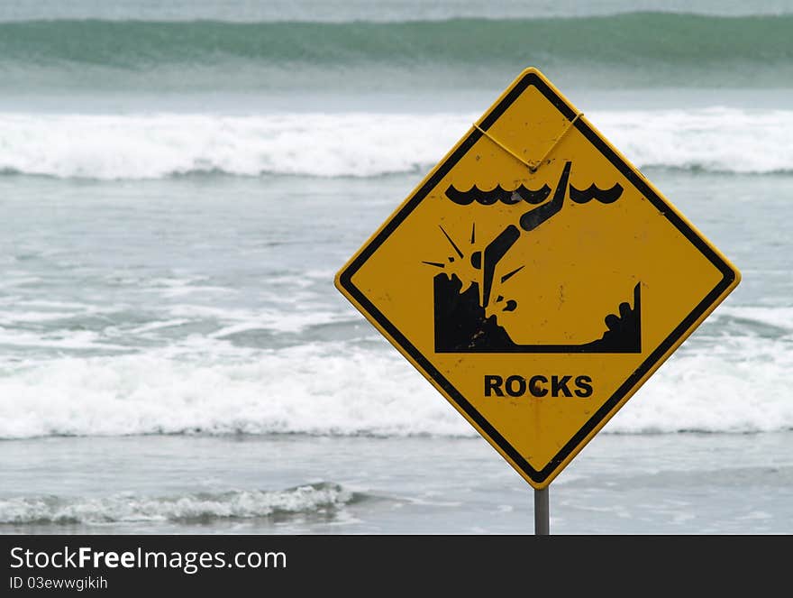 Warning sign on the beach, Raglan, New Zealand