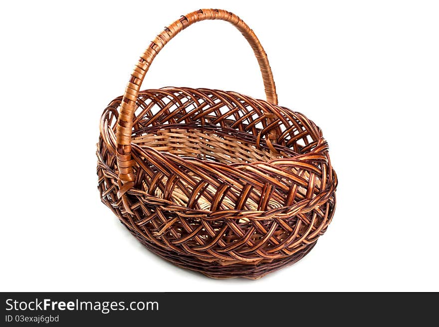 Wicker basket isolated on a white background