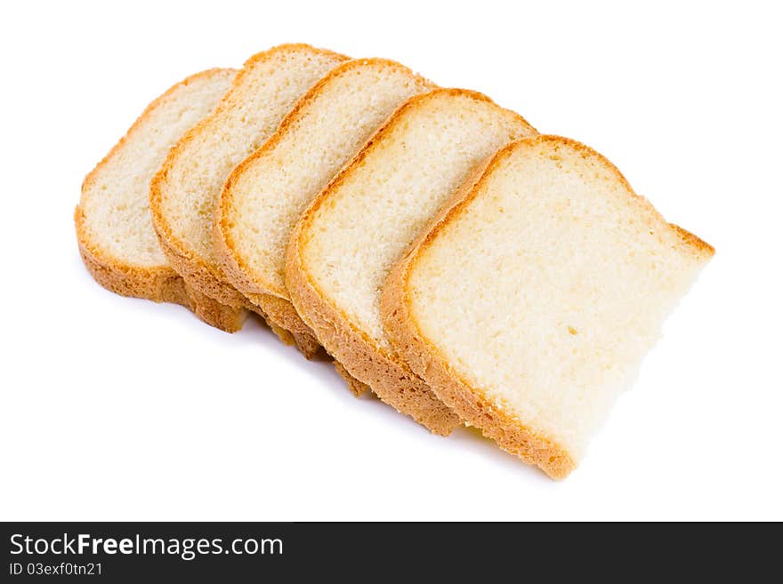 Fresh hot slices of home-made bread isolated on a white background