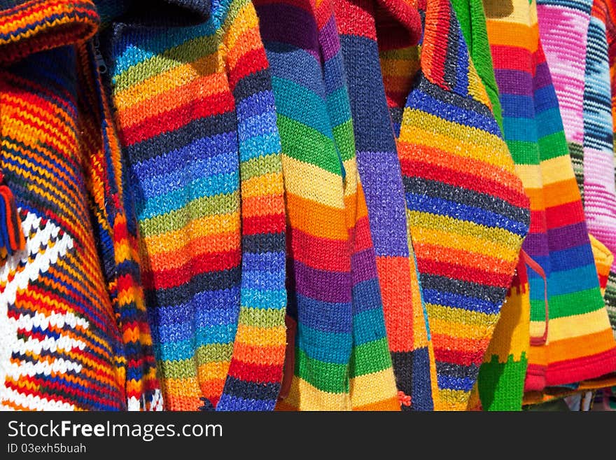 Close up of the texture of several colorful wool clothes. Close up of the texture of several colorful wool clothes