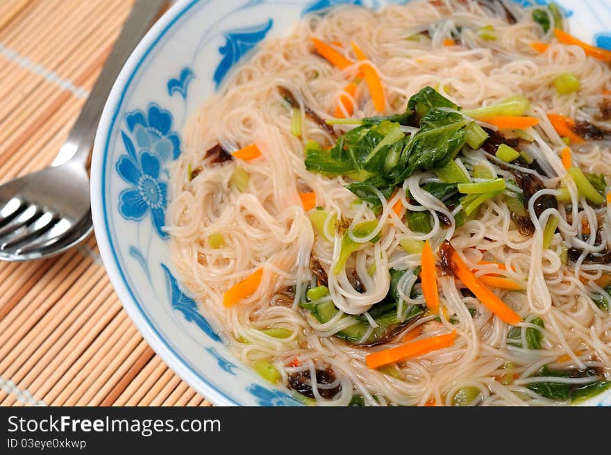 Asian style vermicelli delicacy prepared with healthy vegetables. Asian style vermicelli delicacy prepared with healthy vegetables.