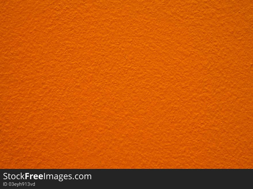 The cement walls painted orange