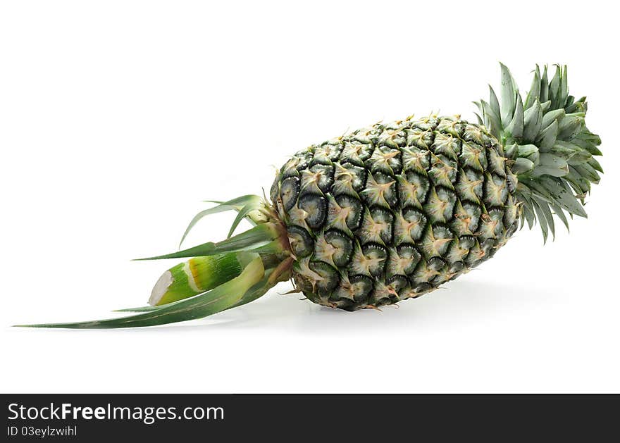 Single pineapple isolated on white background