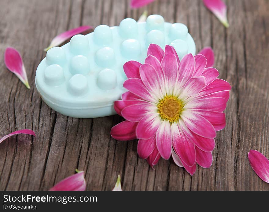 Bar of natural blue soap with violet flowers