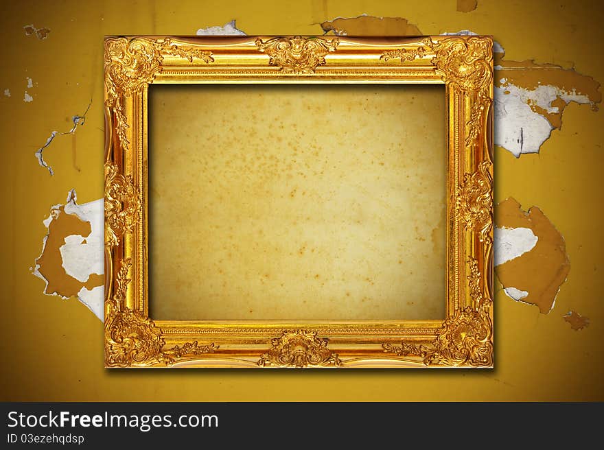 Photo frame on aged brown wall background