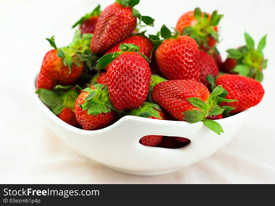 Fresh strawberries on a white background