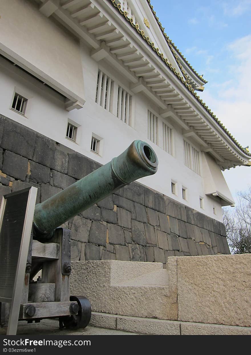 A great view of the ancient Osaka Castle with cannon, which located in the heart of Osaka City, Japan. A great view of the ancient Osaka Castle with cannon, which located in the heart of Osaka City, Japan.