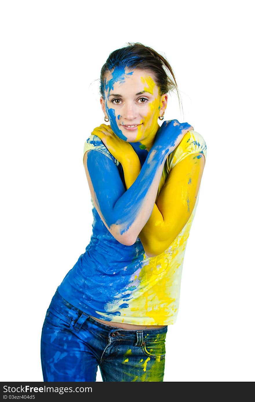 Young woman covered with paint looking at camera. Young woman covered with paint looking at camera