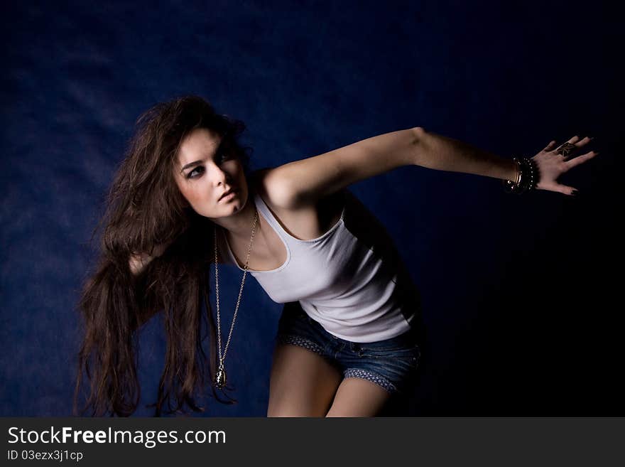 The beautiful mystical women on the dark blue background.