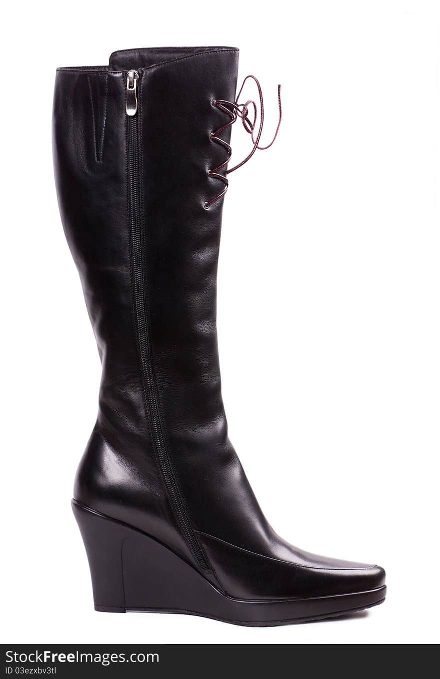 Black boot feminine over white background