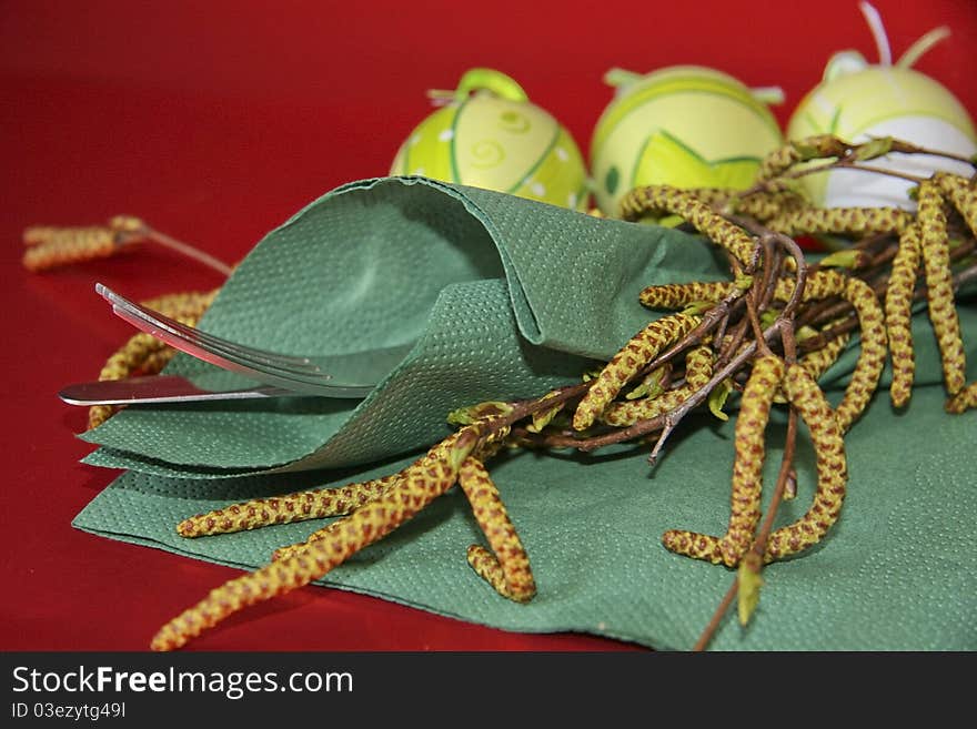 Eastertime table setting, eggs, fork, napkin