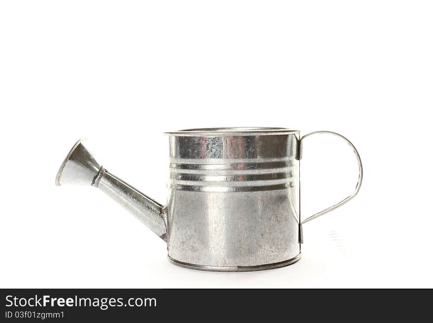 Watering Can- Tilted isolated on a white background. Watering Can- Tilted isolated on a white background