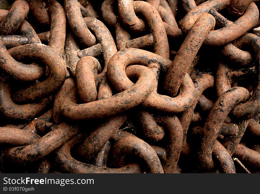 An old chain covered in rust -- corroded links of iron -- The destructive action of time upon matter. An old chain covered in rust -- corroded links of iron -- The destructive action of time upon matter