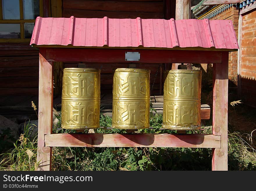 Prayer wheels in a monastery of Mongolia, in Asia. Prayer wheels in a monastery of Mongolia, in Asia