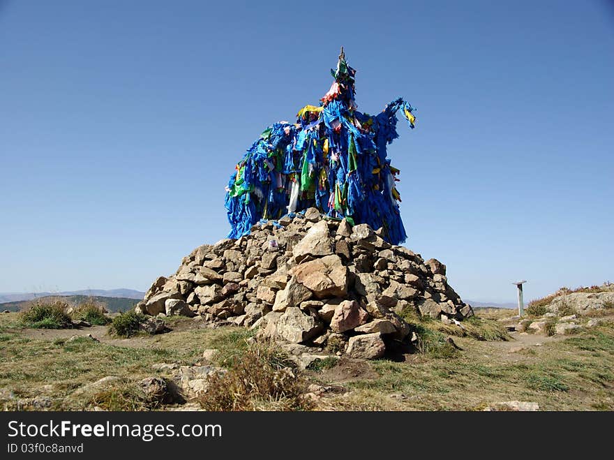 A shaman ovoo in the steppes of Mongolia, in Asia. A shaman ovoo in the steppes of Mongolia, in Asia