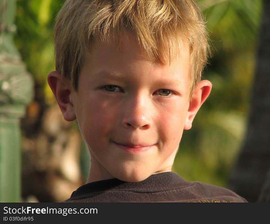 Portrait Of A Boys Face With Trees