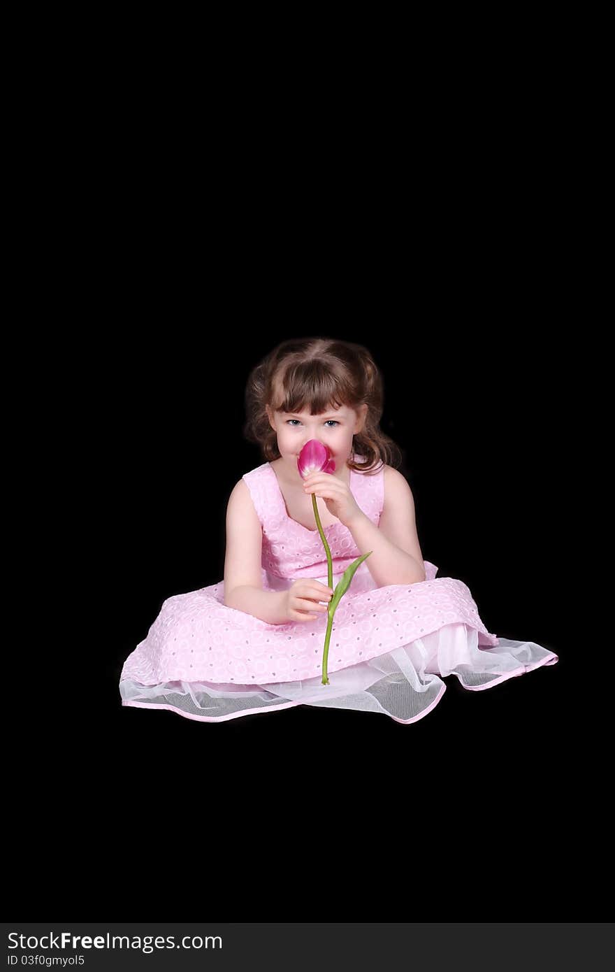 Adorable Little Girl Smelling Tulip Isolated