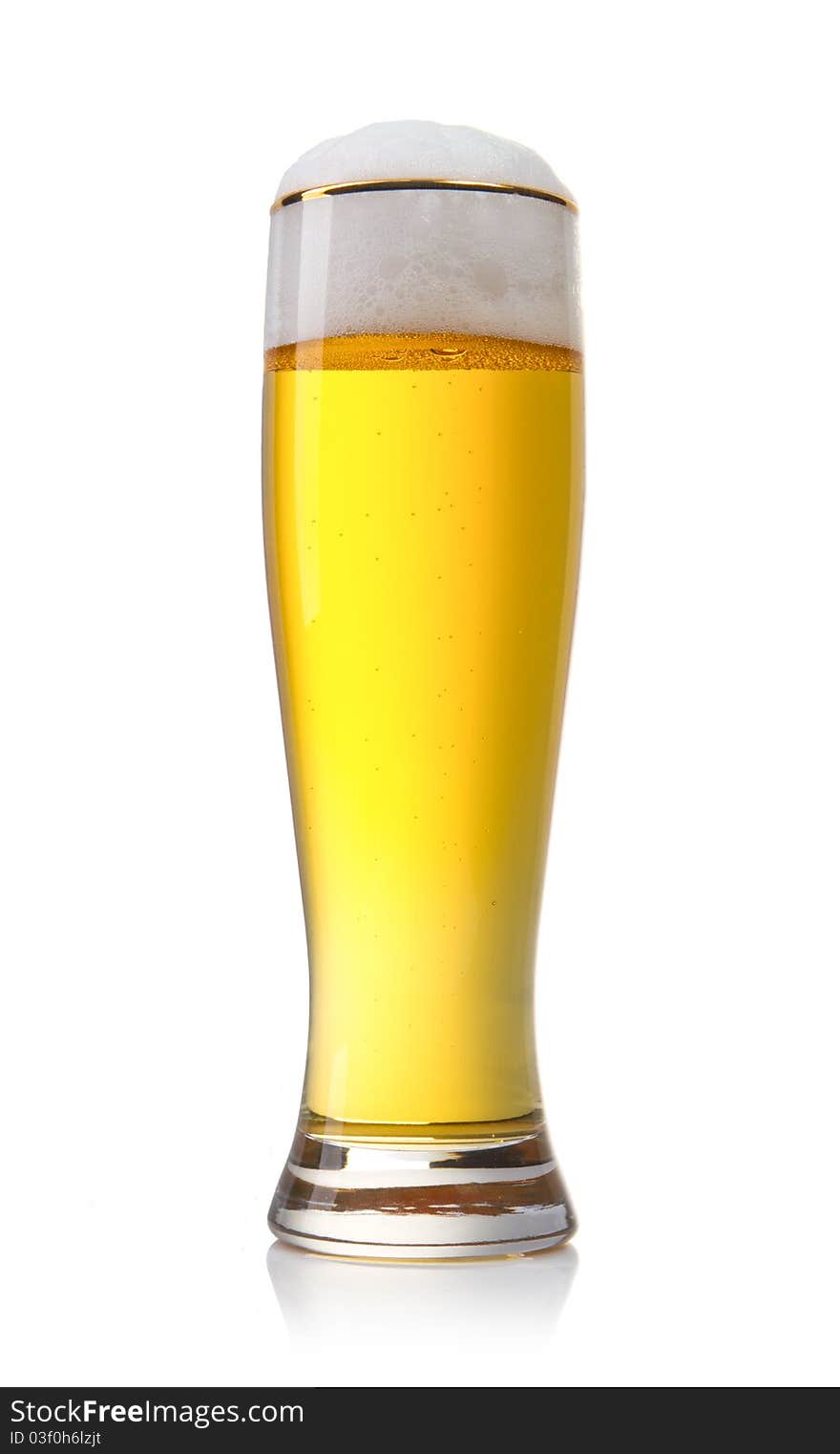 Beer into glass isolated on white. Beer into glass isolated on white