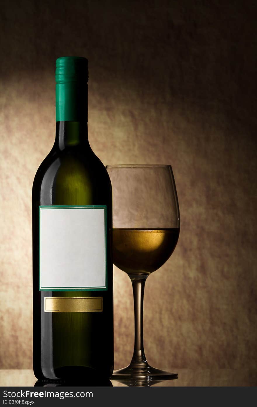 Bottle With White Wine And Glass