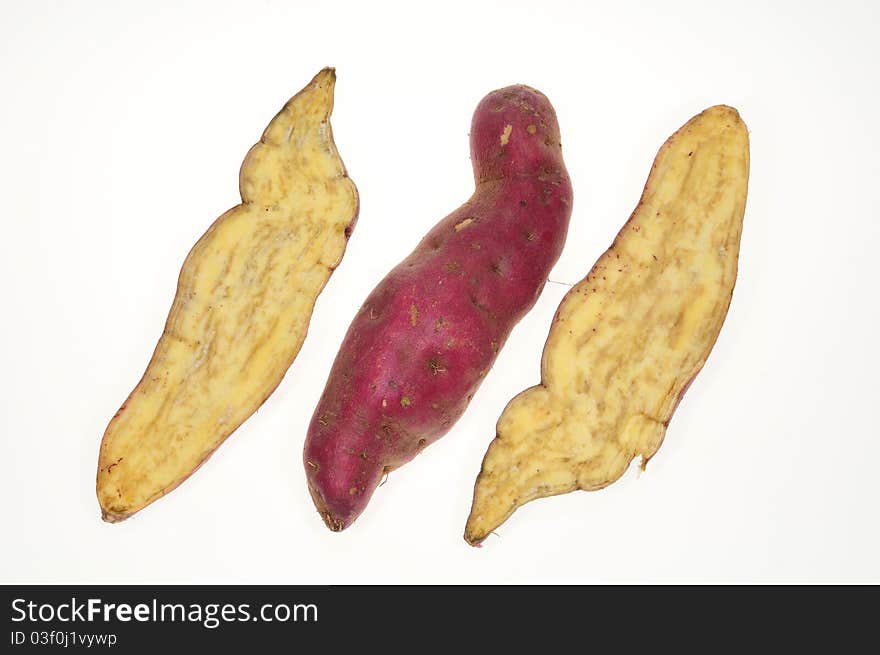 Sweet Potatoes With Sectional View. Image Is Isolated On White Background