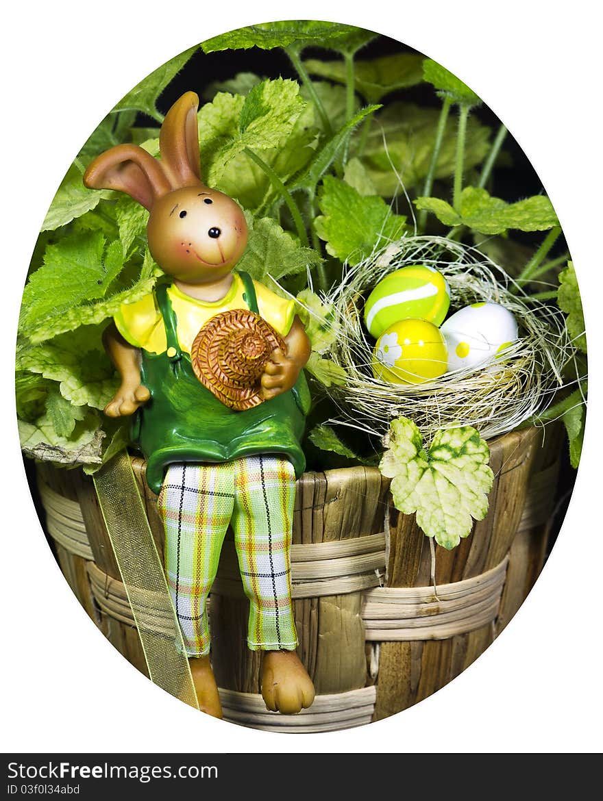 Bunny With Easter Eggs With A Plant In Backgroun