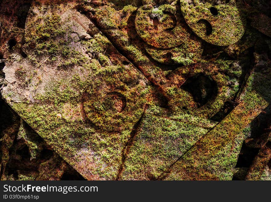 Composite image, simulating moss covering old metal tool items. Composite image, simulating moss covering old metal tool items.