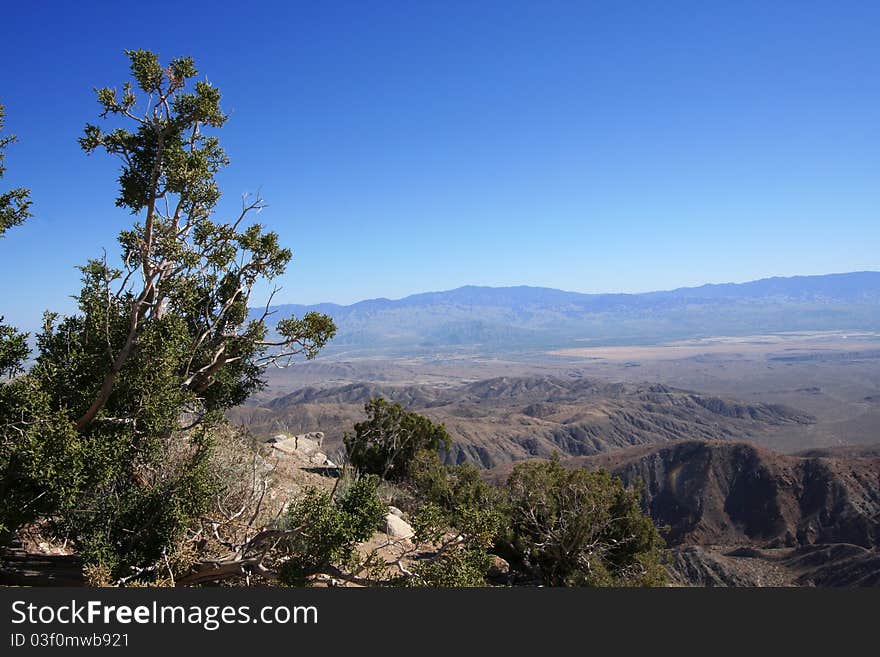 A view of the Coachella Valley and the San Jacinto and Santa Rosa Mountains from Keys View in Joshua Tree National Park. The San Andreas Fault is the dark horizontal ridge in the valley on the right hand side. A view of the Coachella Valley and the San Jacinto and Santa Rosa Mountains from Keys View in Joshua Tree National Park. The San Andreas Fault is the dark horizontal ridge in the valley on the right hand side.