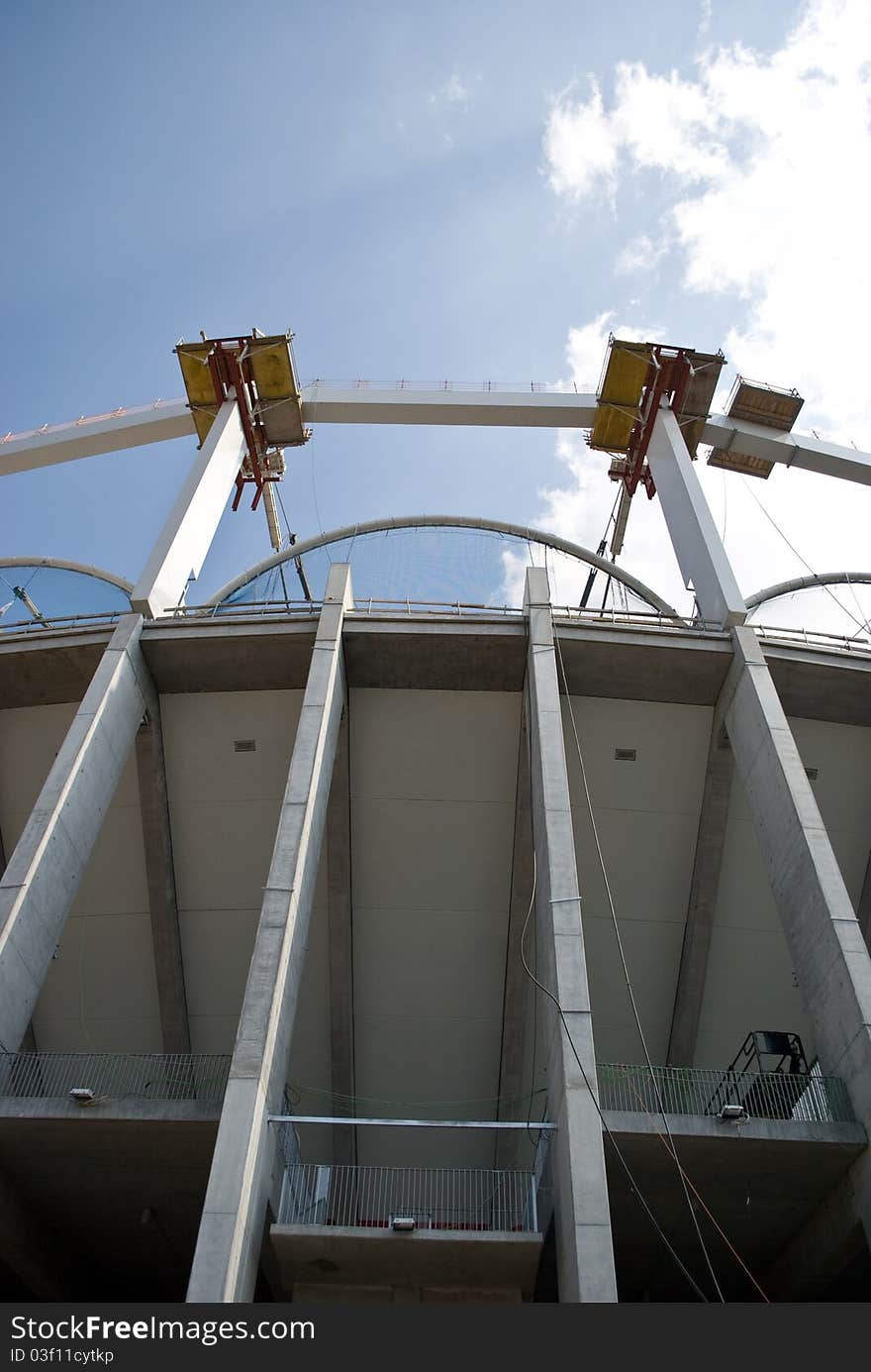 Big stadium pillars pointing towards the sky