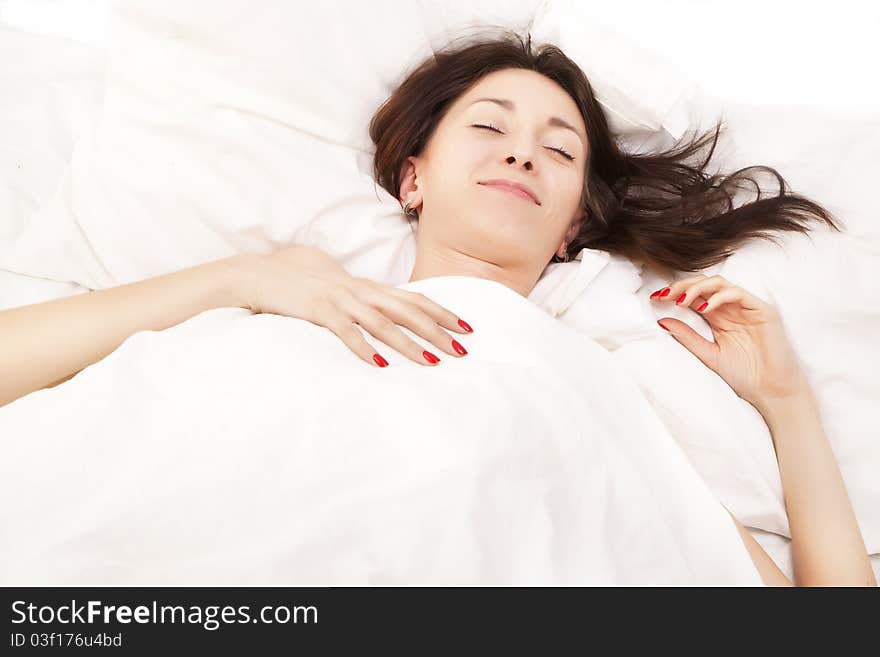 Portrait of a adult brunette in bed. Portrait of a adult brunette in bed