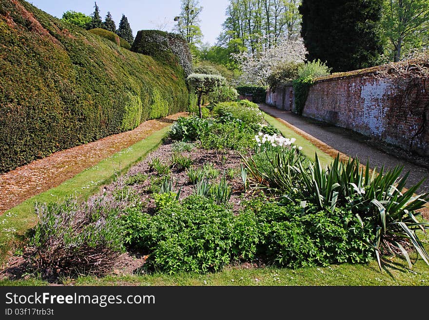 A Formal english Walled garden with flowerbeds and hedging. A Formal english Walled garden with flowerbeds and hedging