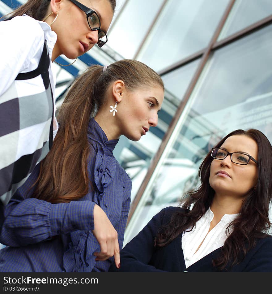 Outdoor business girlfriends stay together