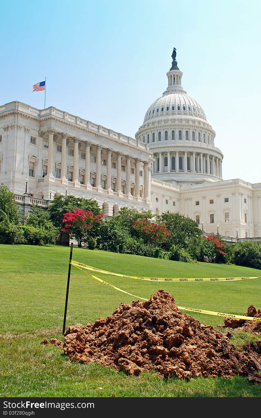 A beautiful day on Capitol Hill. The Congress building with an American flag flying. However, there is some construction going on. Are they fixing Washington? Could represent the sequester or sequestration. A beautiful day on Capitol Hill. The Congress building with an American flag flying. However, there is some construction going on. Are they fixing Washington? Could represent the sequester or sequestration.