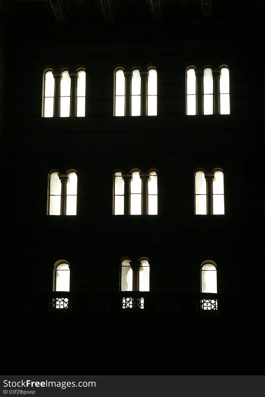 The interior of the Cathedral of Pisa in back light. The interior of the Cathedral of Pisa in back light