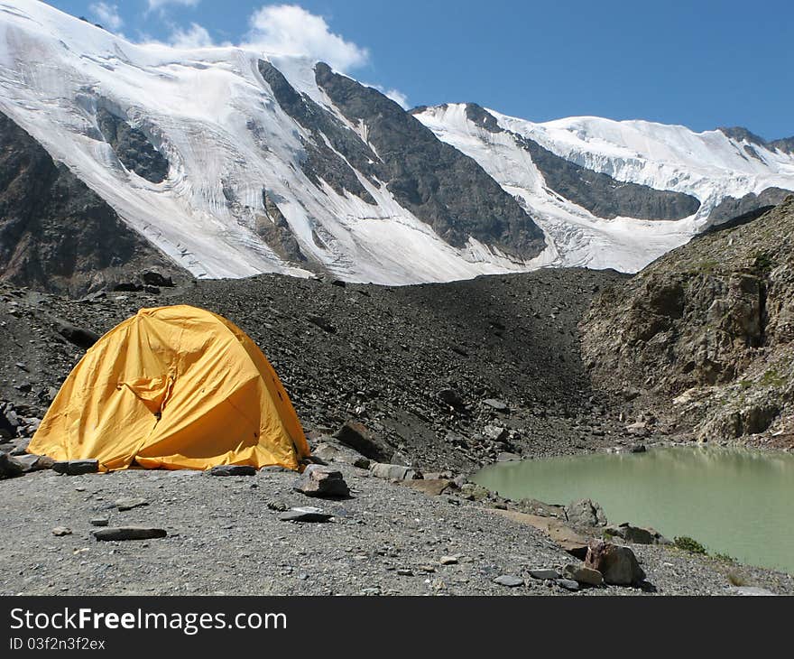 Landscape of Siberian highland with the cristall green lake. altitude is 3500 m. Landscape of Siberian highland with the cristall green lake. altitude is 3500 m