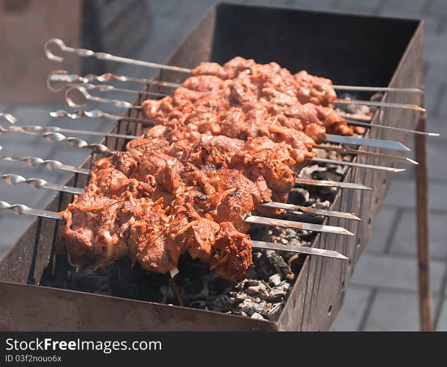 Kebab of pork with onions