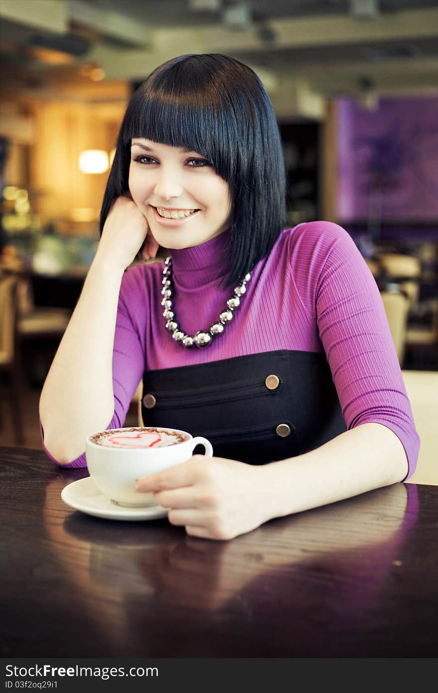 Young woman in cafe