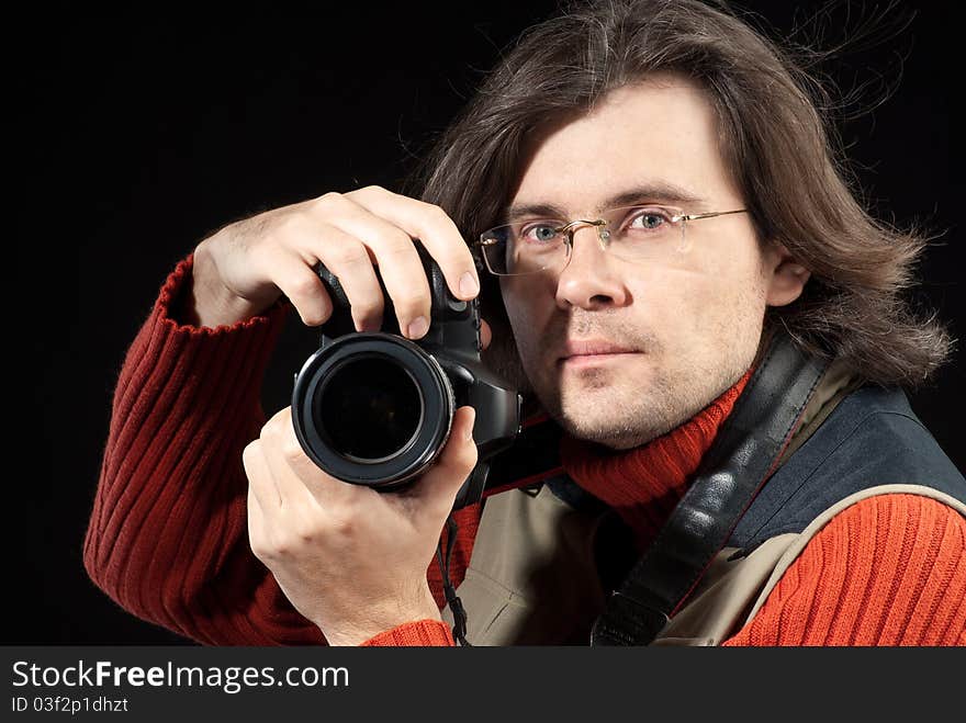 Long hair man with camera. Long hair man with camera