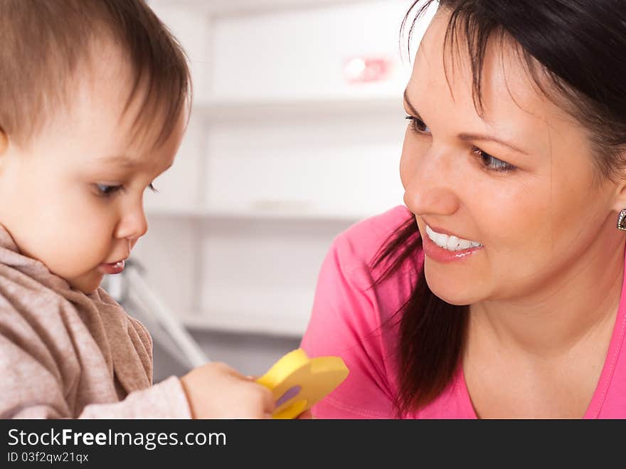 Mom and a baby on a white background