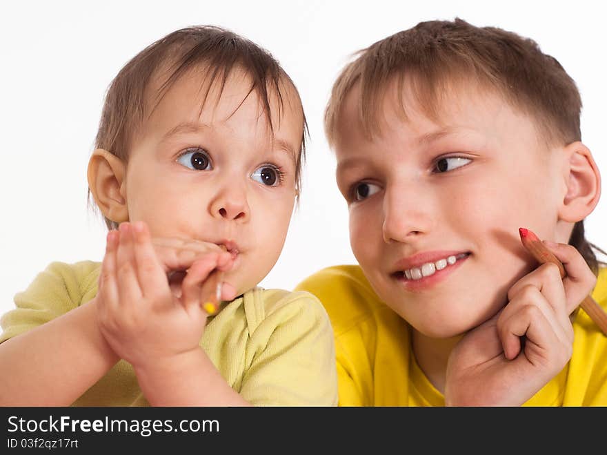 Happy brother and sister on a white background