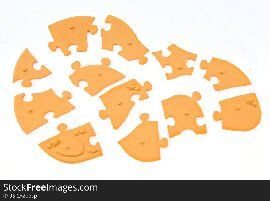 The light brown of jigsaw puzzle. it look like a map.