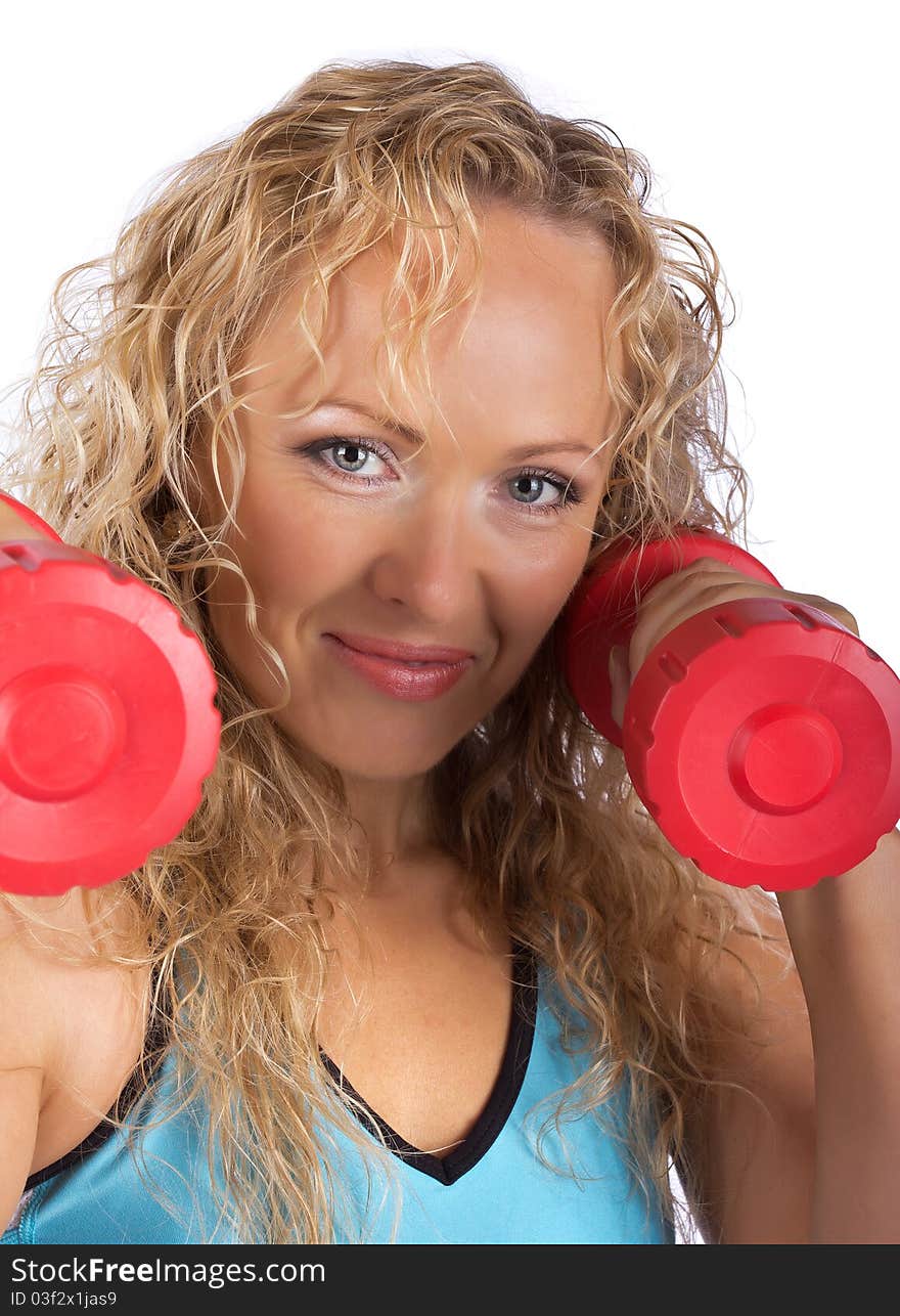 Blonde holding weights