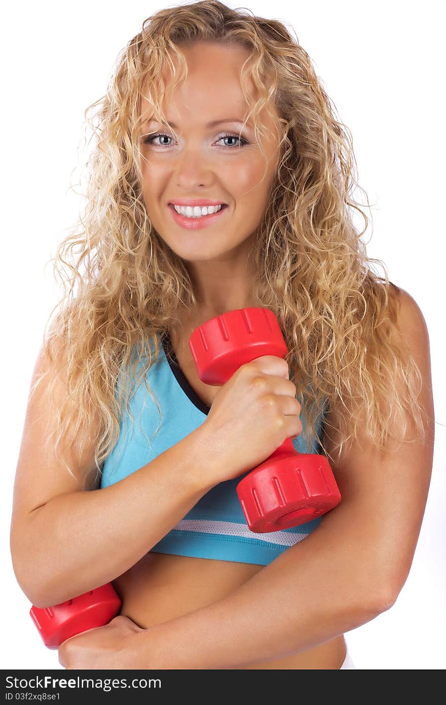 Woman is smiling and exercising. Woman is smiling and exercising