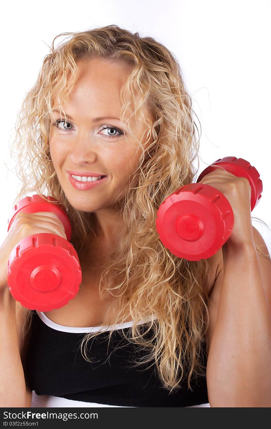 Blonde lifting dumbbells