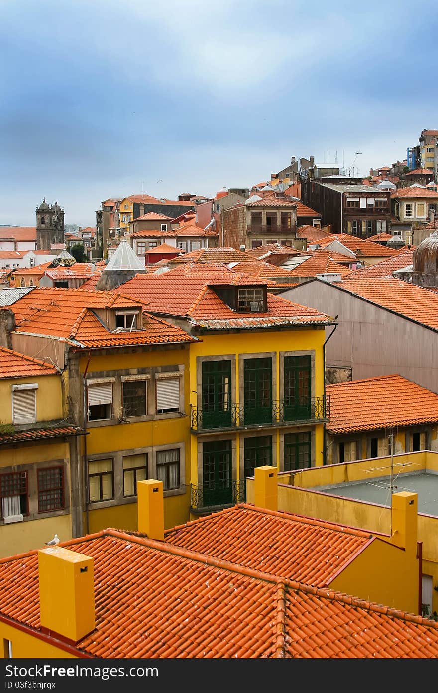 Classic red tile roofs of old houses in Porto, Portugal. Classic red tile roofs of old houses in Porto, Portugal