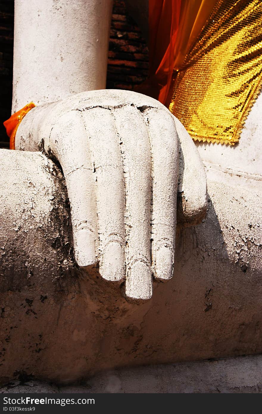 Hand of Buddha a Bodhisattva brown background