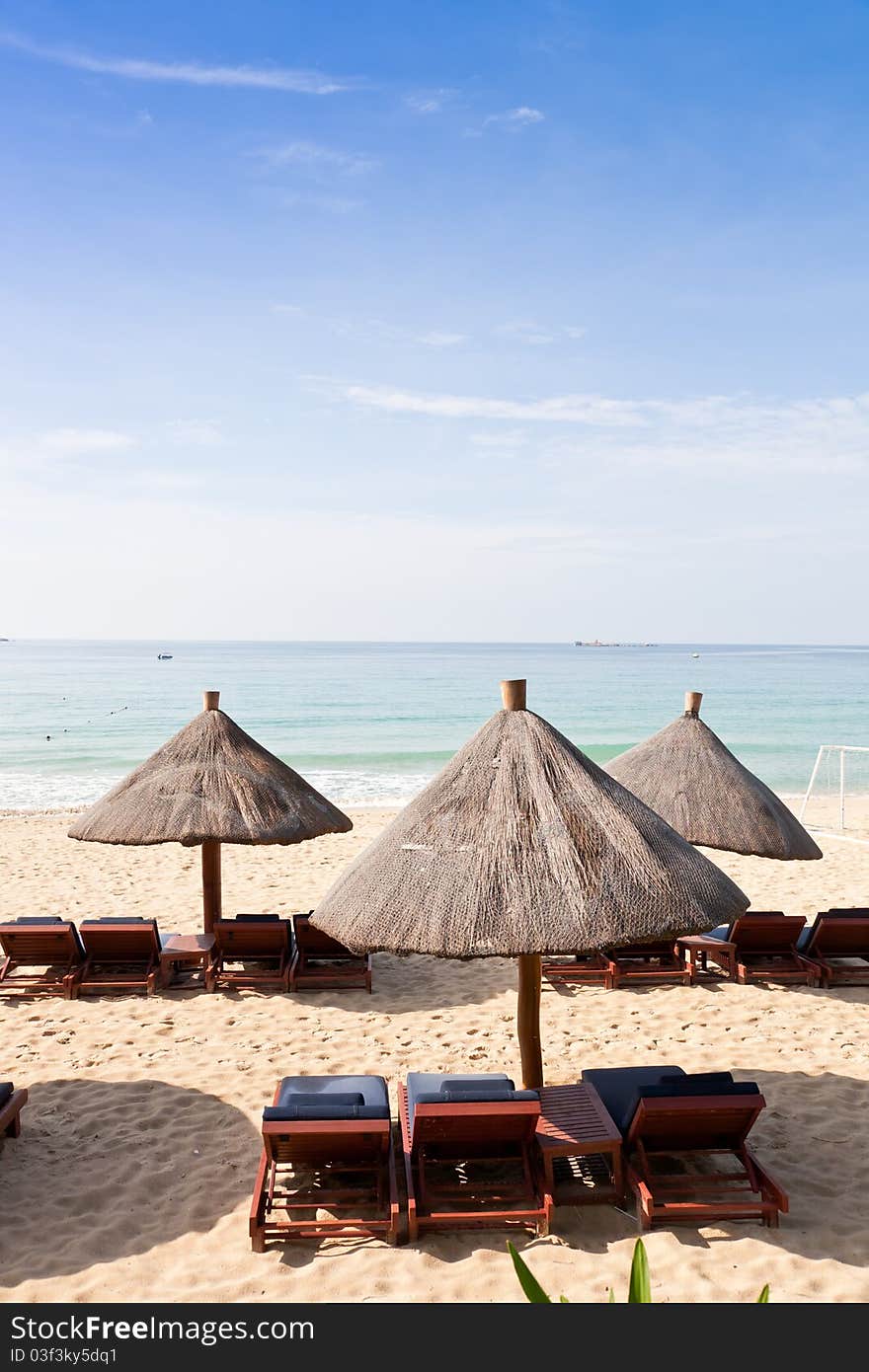 Sunchairs and umbrella on the beach. Sunchairs and umbrella on the beach.