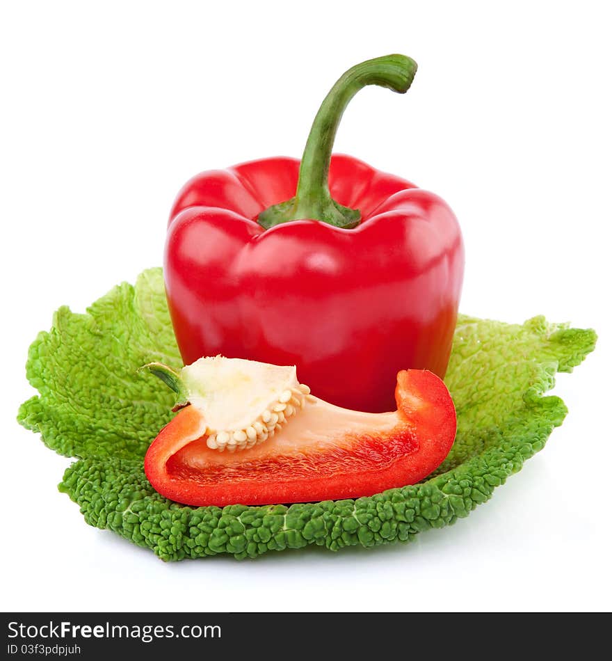 Red Pepper with a slice cut on a piece of cabbage